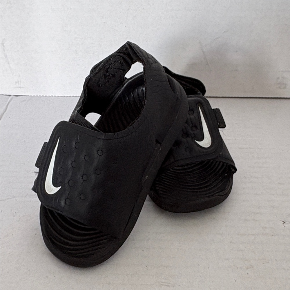 Nike Kids Black Slide Sandals with White Swoosh Accent